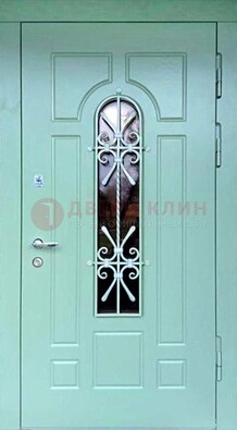 Светло-зеленая железная дверь со стеклом и ковкой ДСК-195 в Нижнем Новгороде