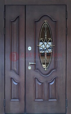 Темная металлическая дверь Винорит со стеклом и ковкой ДСК-239 в Костроме