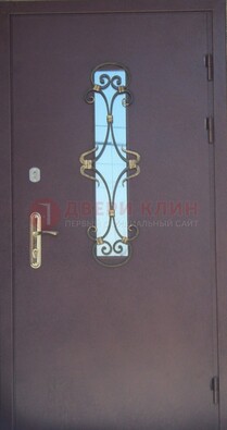Металлическая дверь со стеклом и ковкой ДСК-77 в Костроме